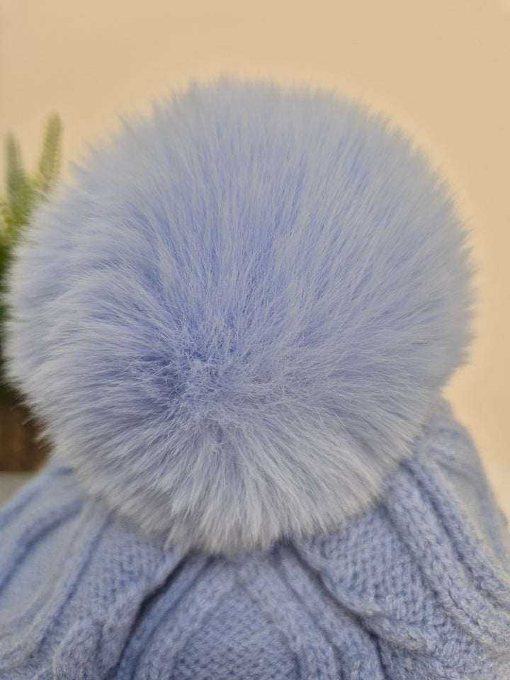 Oslo Faux Fur Pom Pom Cable Hat & Soft Feel Brushed Tassel Scarf Bundle - Powder Blue