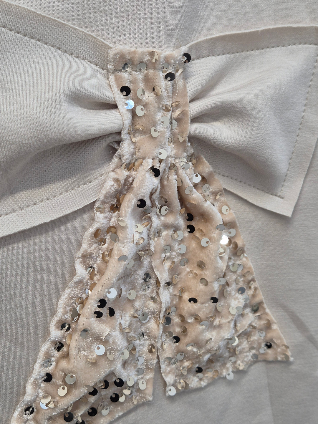 Faulty - Sequin Bow Oversized Top - Cream (Oversized fitting from Size 12/14 up to Size 18/20)