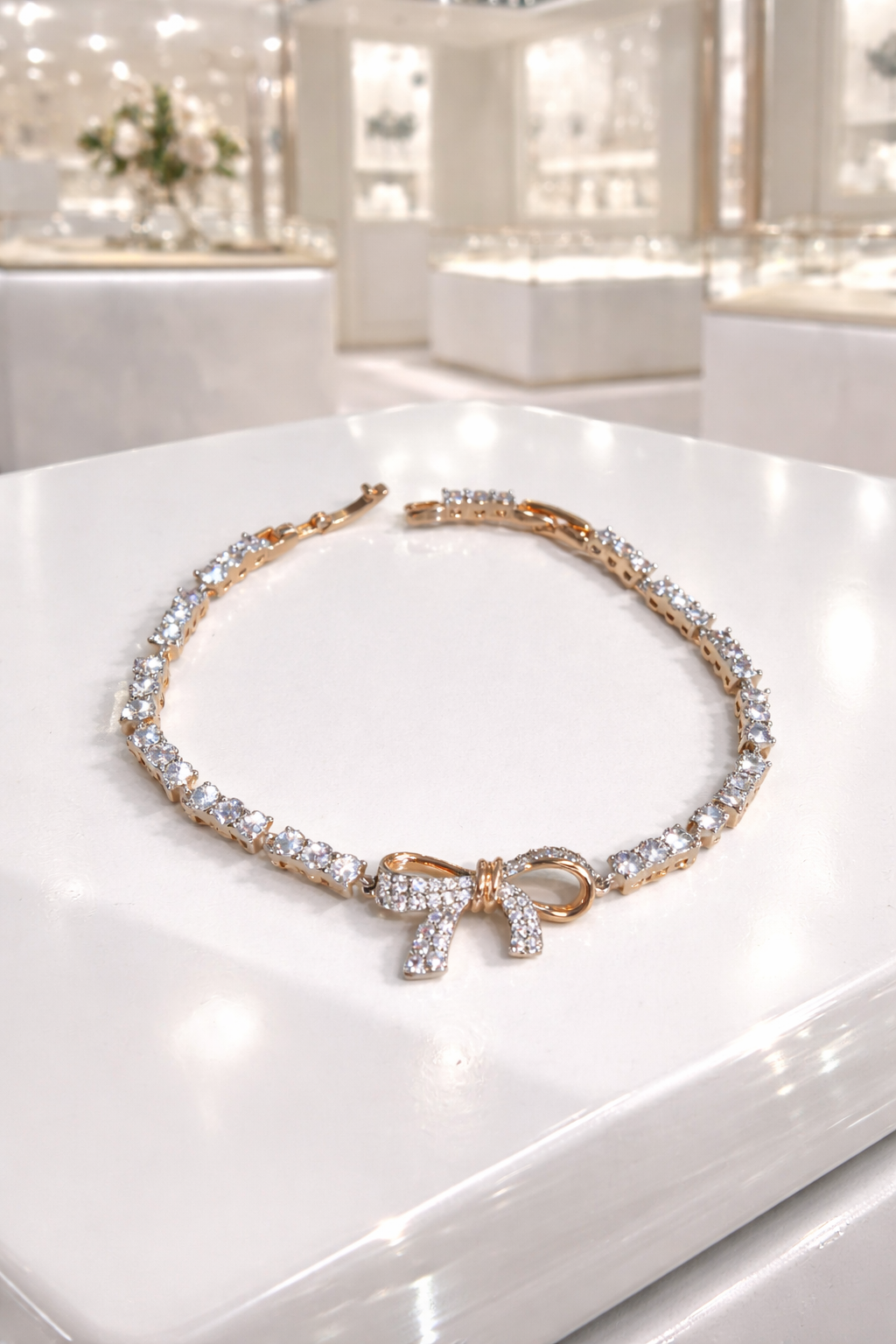 Crystal Bow Tennis Bracelet (Gold Tone)